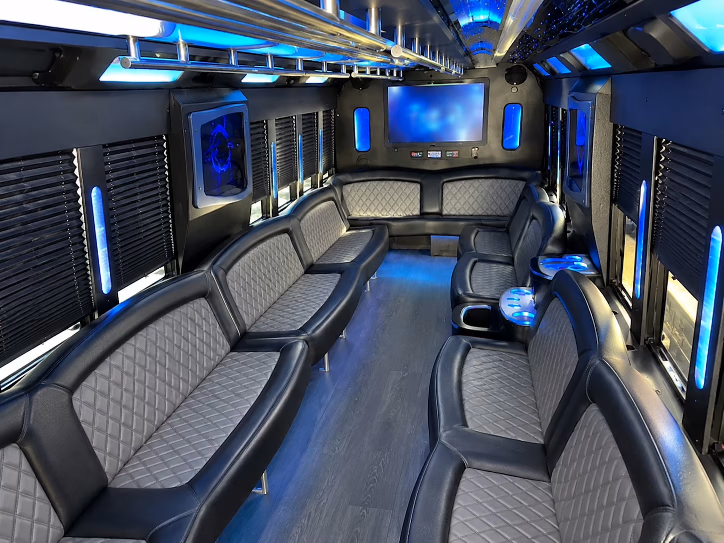 Friends laughing during a party bus celebration in Scottsdale